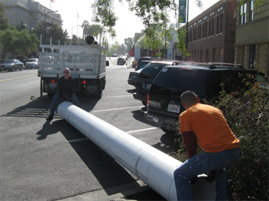 Elevator piston hole liner pipe being delivered.