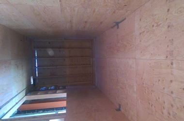 Plywood added to the interior of the elevator shaft.