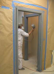 Painting door frames.