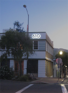 LED lit Streamline Moderne address numbers at dusk.