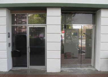 A “before” and “after” image of the mirror finish stainless steel doors.