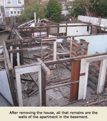 After the house was moved, only basement walls remain.